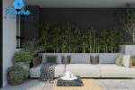 Biophilic design living room in Australia with indoor plants stone surfaces and natural light