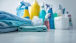 Close-up image of microfiber cloths and cleaning supplies arranged neatly together