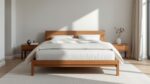 Stylish timber queen bed frame in a modern Australian bedroom with white linen