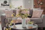 Well-proportioned living room showing the rule of three in decorative accessories arrangement